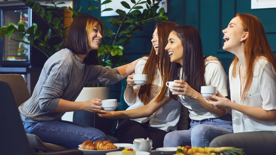Group of friends chatting over coffee.