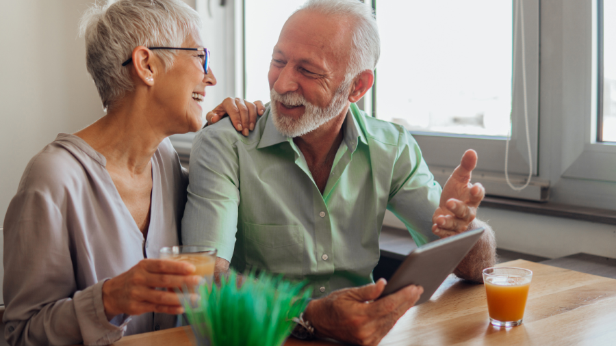 An older couple engaging in SLP services.