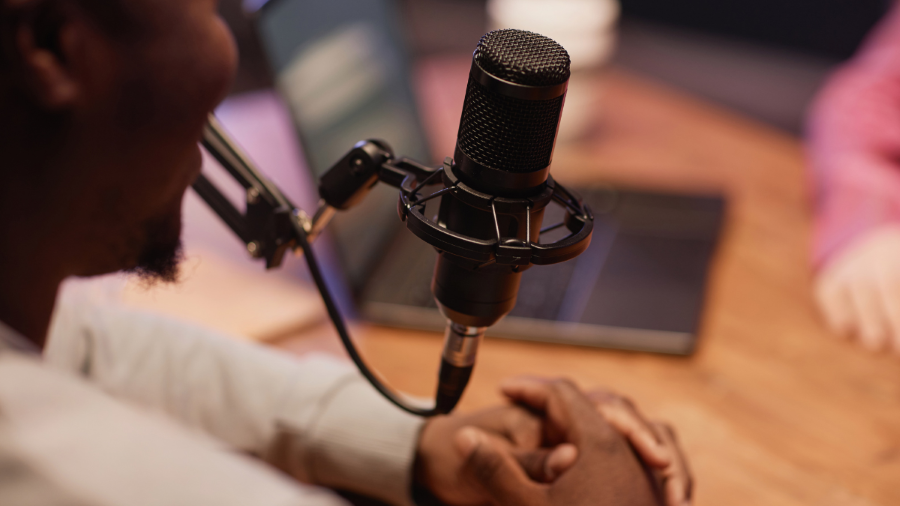 A male speaking into a microphone.